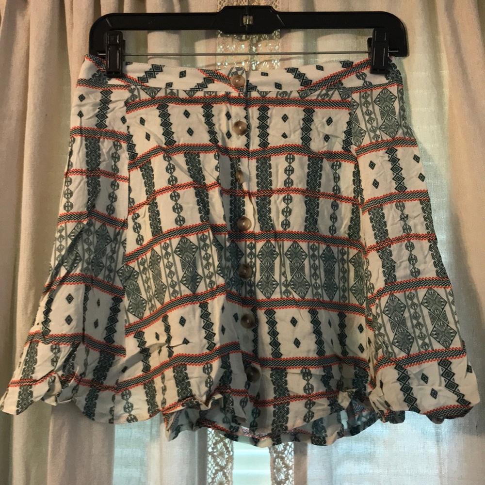 Green and orange printed skirt.